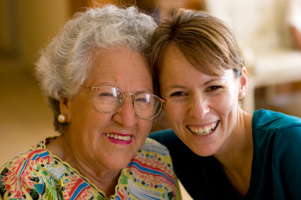 elderly woman with younger daughter