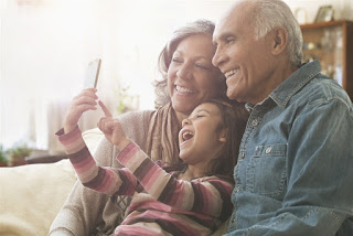 grandparents with granddaughter