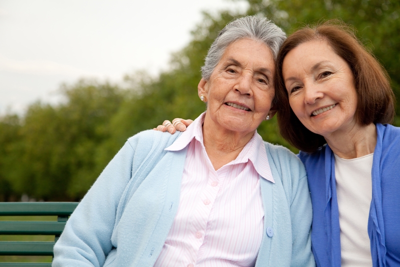 elderly woman and caregiver