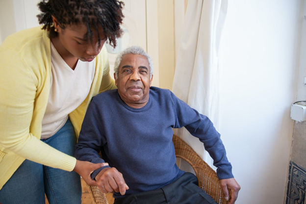 elderly man receiving assistance