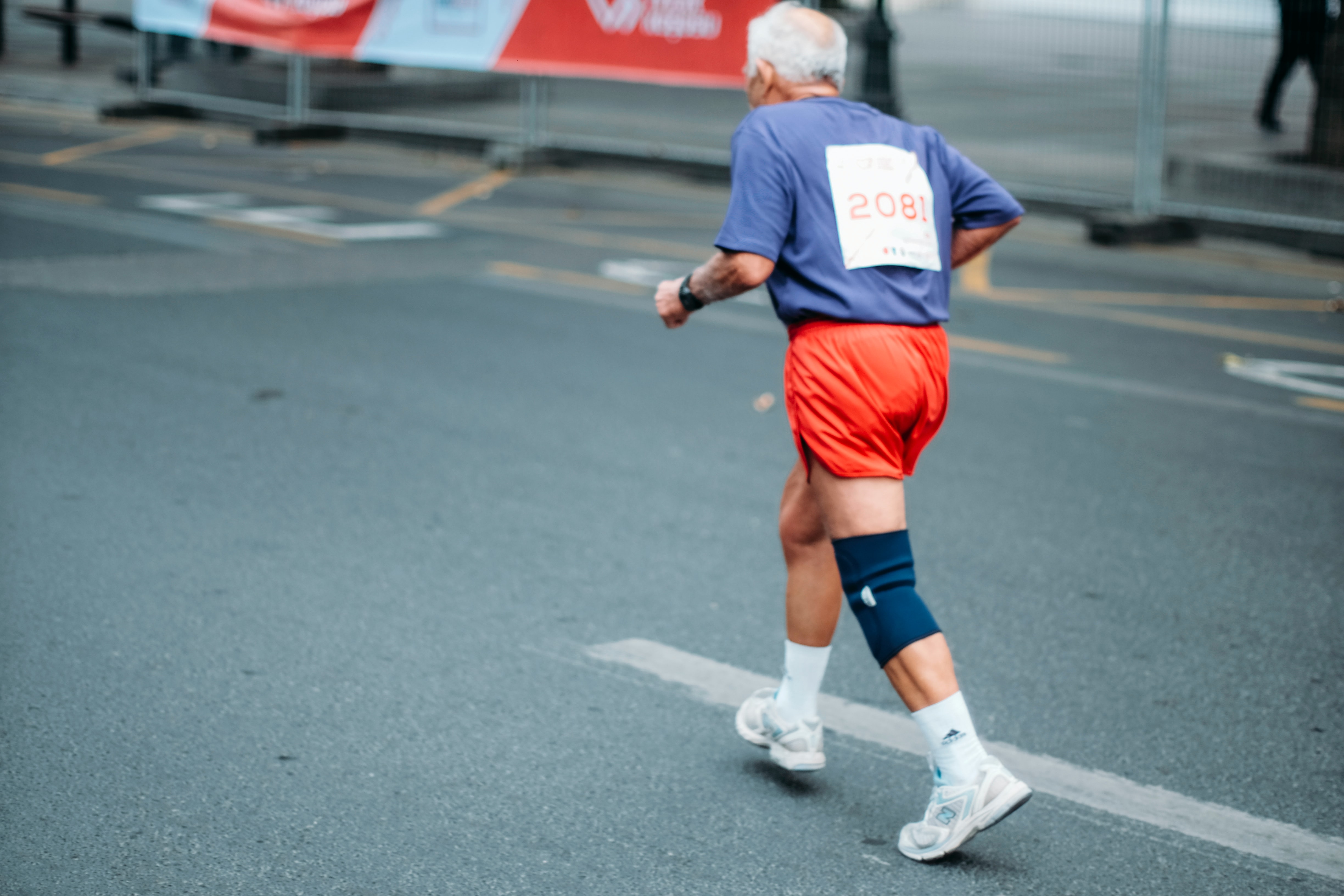 elderly man running