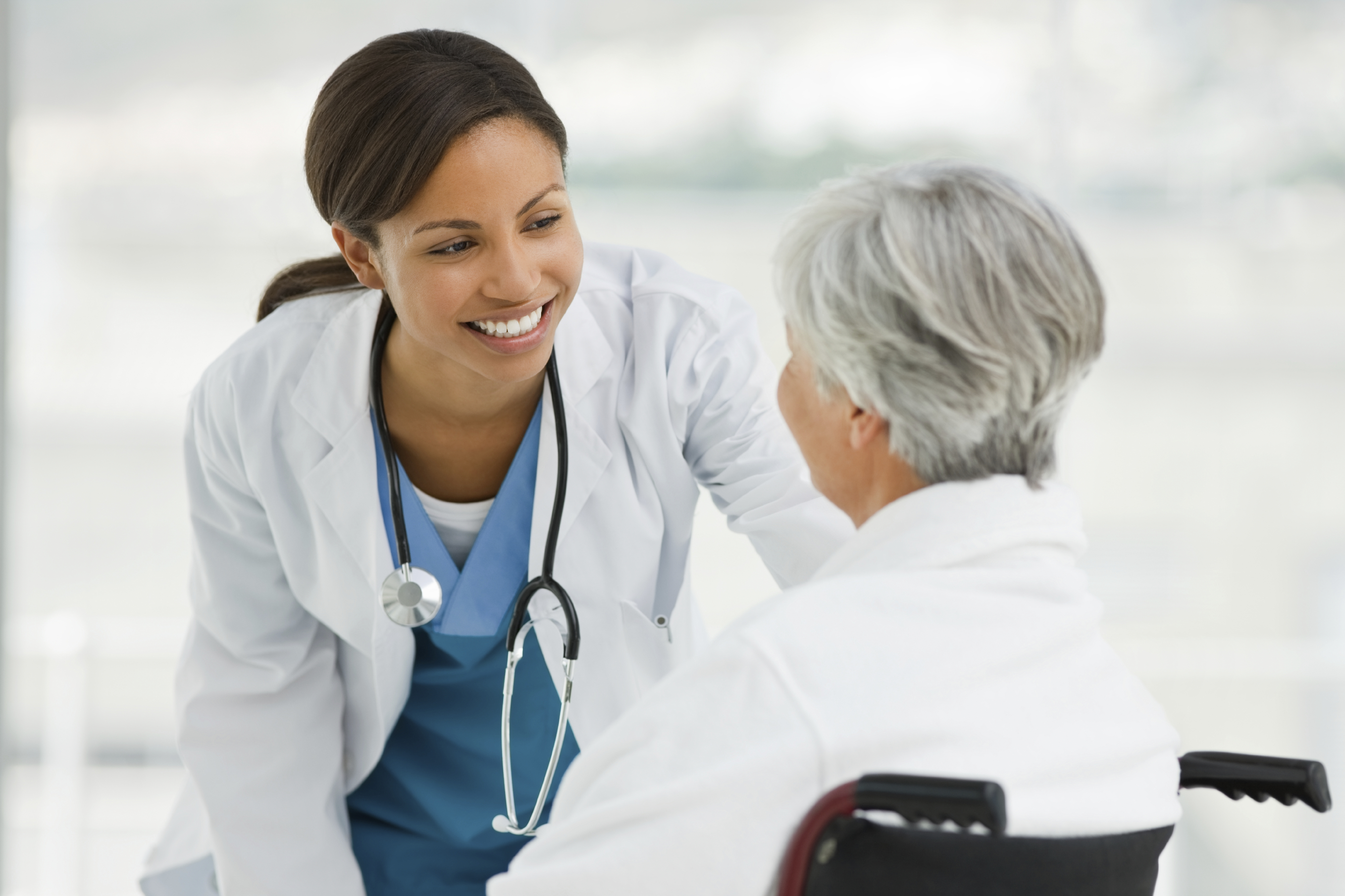 elderly woman with doctor