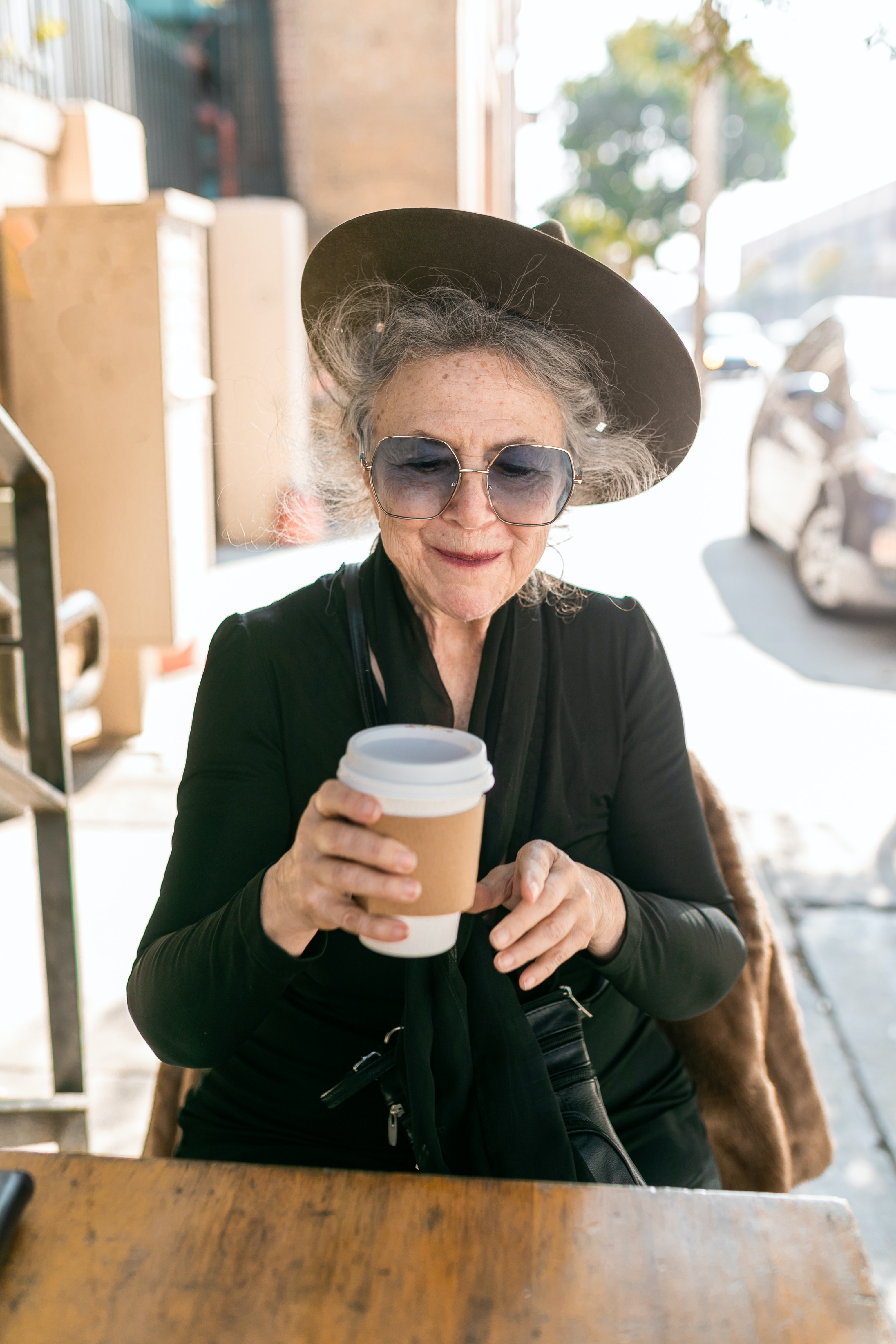 classy elderly woman in hat